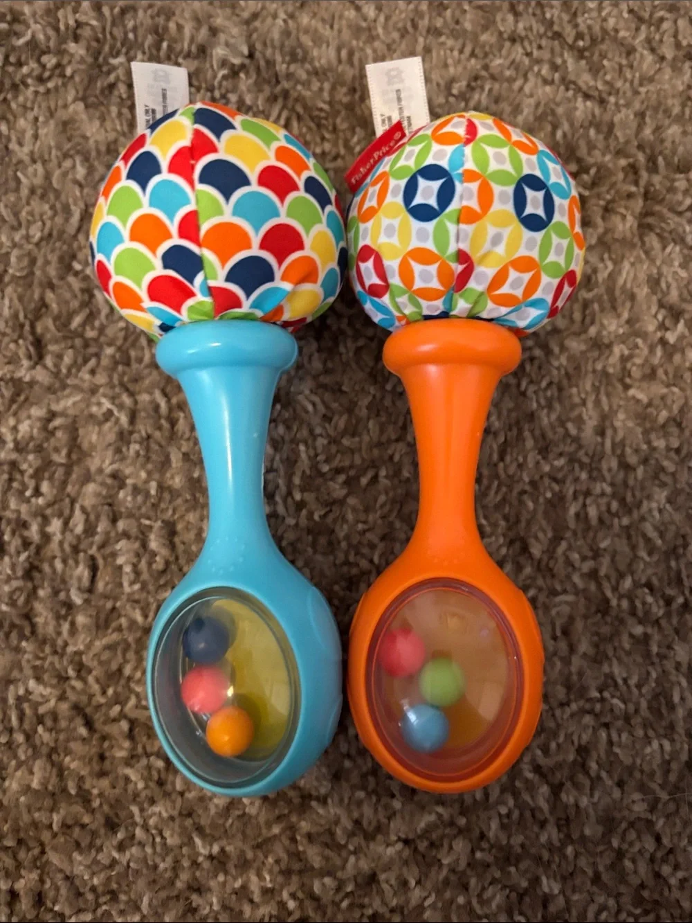 Fisher-Price Bright Orange Tambourine with Colorful Blue and Orange Rattles
